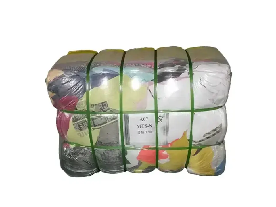 A wrapped bale of men's t-shirts