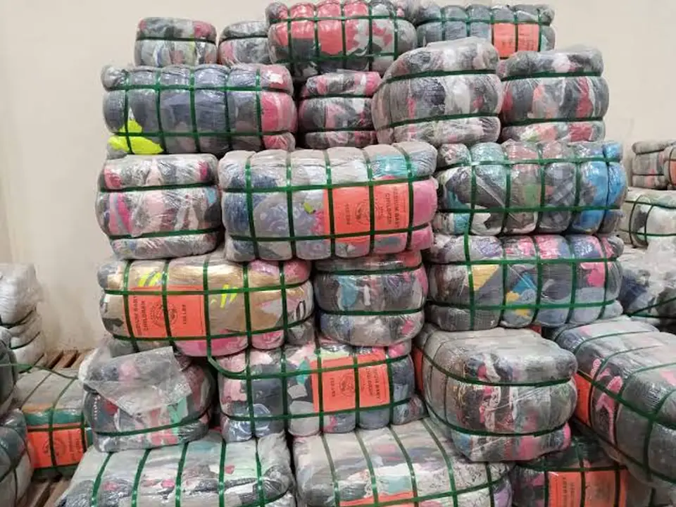 Wrapped bales with orange grade labels